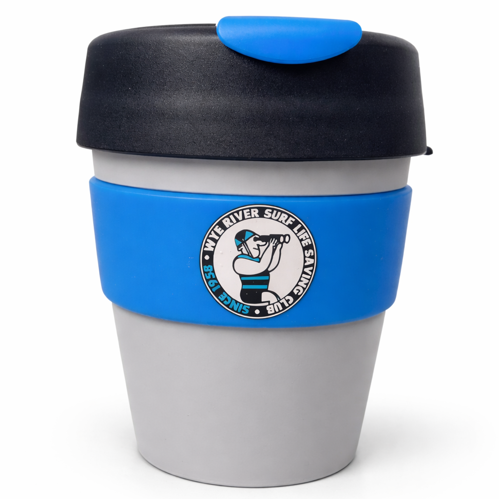 Reusable coffee cup with blue lid and sleeve on a white background